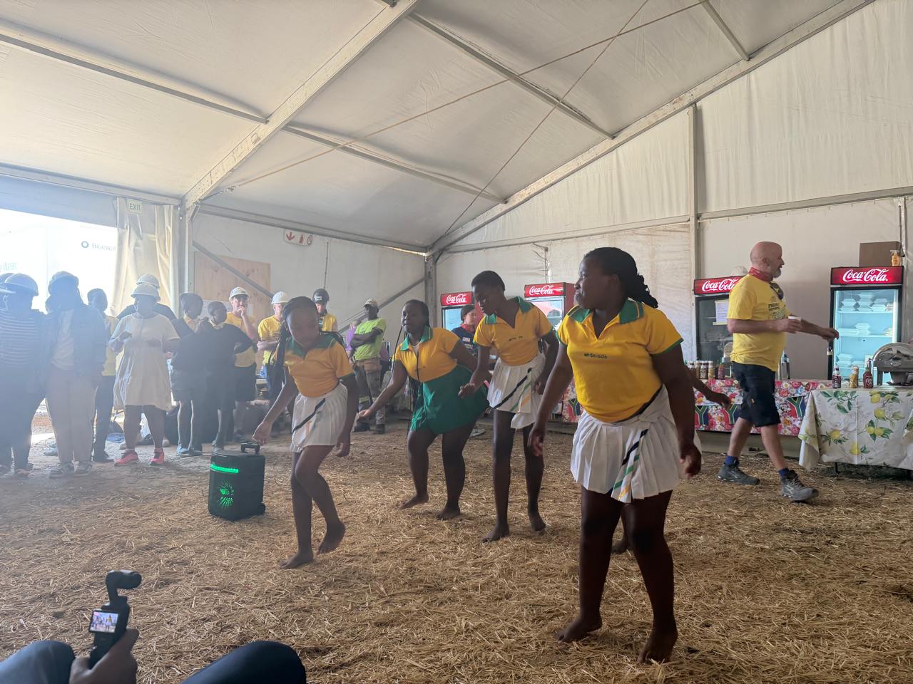 Pupils performing for volunteers at the Mellon Educate Building Blitz in South Africa